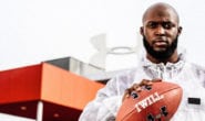 Leonard Fournette Poses with football